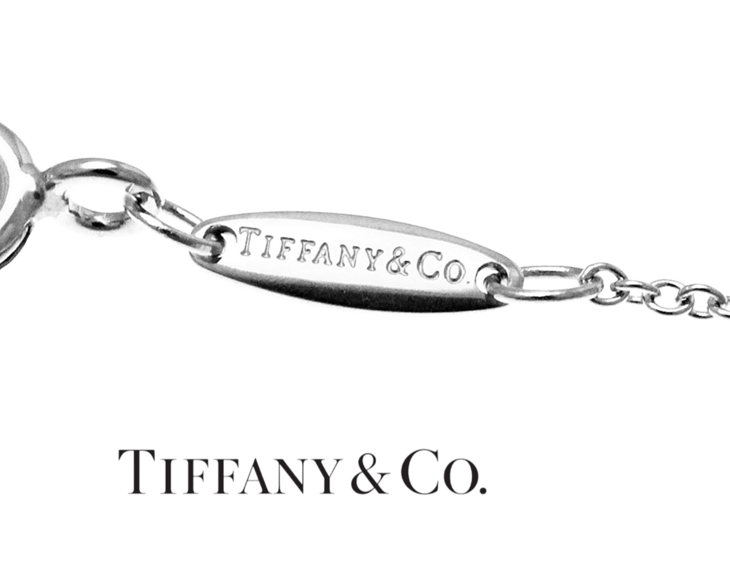 Ciondolo in oro con diamante naturale 0.11 ct (Tiffany & co)