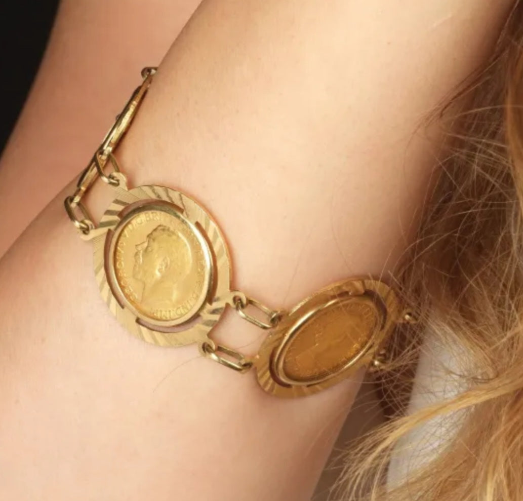 Bracciale in oro giallo con 7 sterline oro 22k