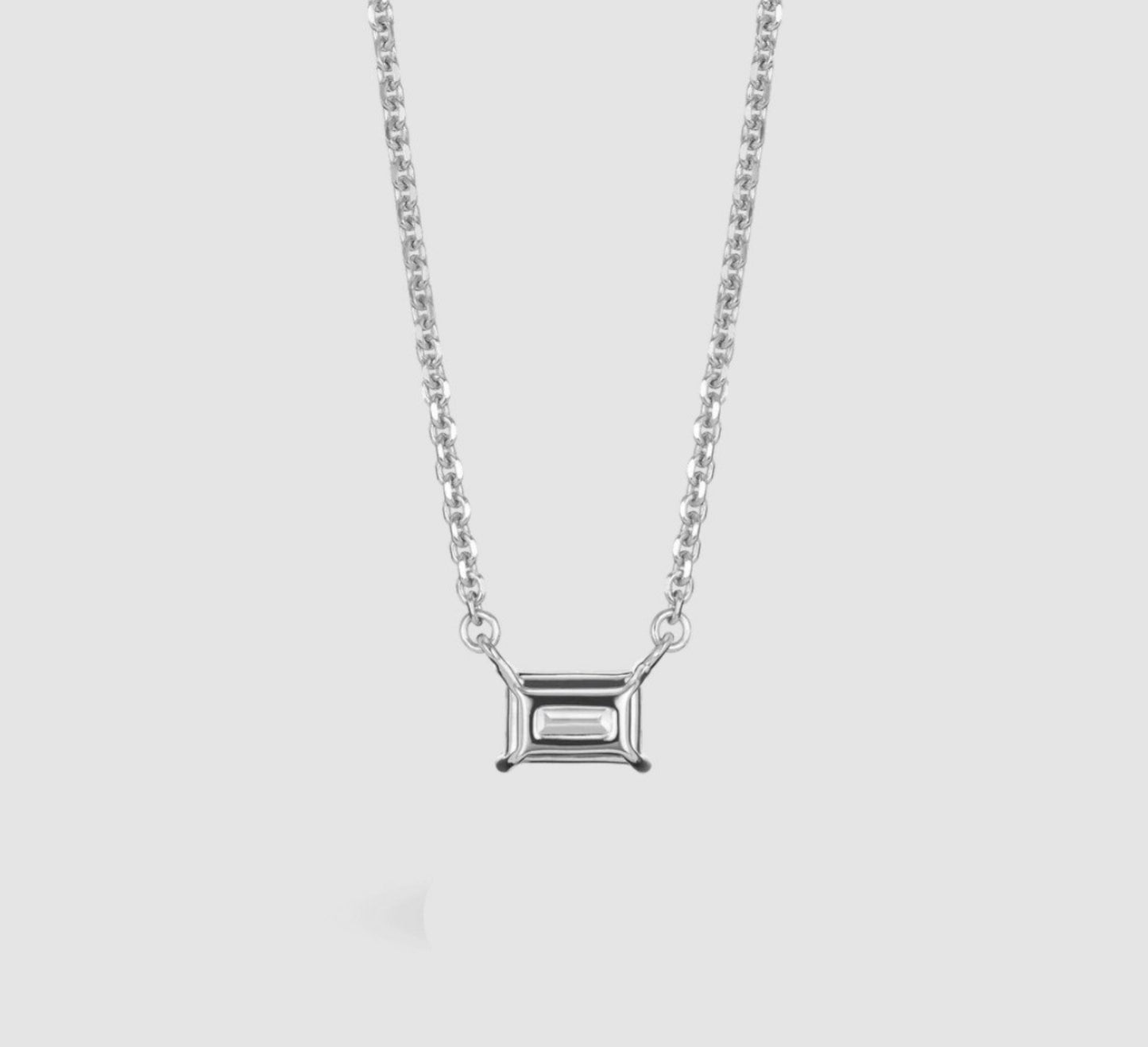 Collana punto luce in oro e diamante naturale smeraldo 0.22ct