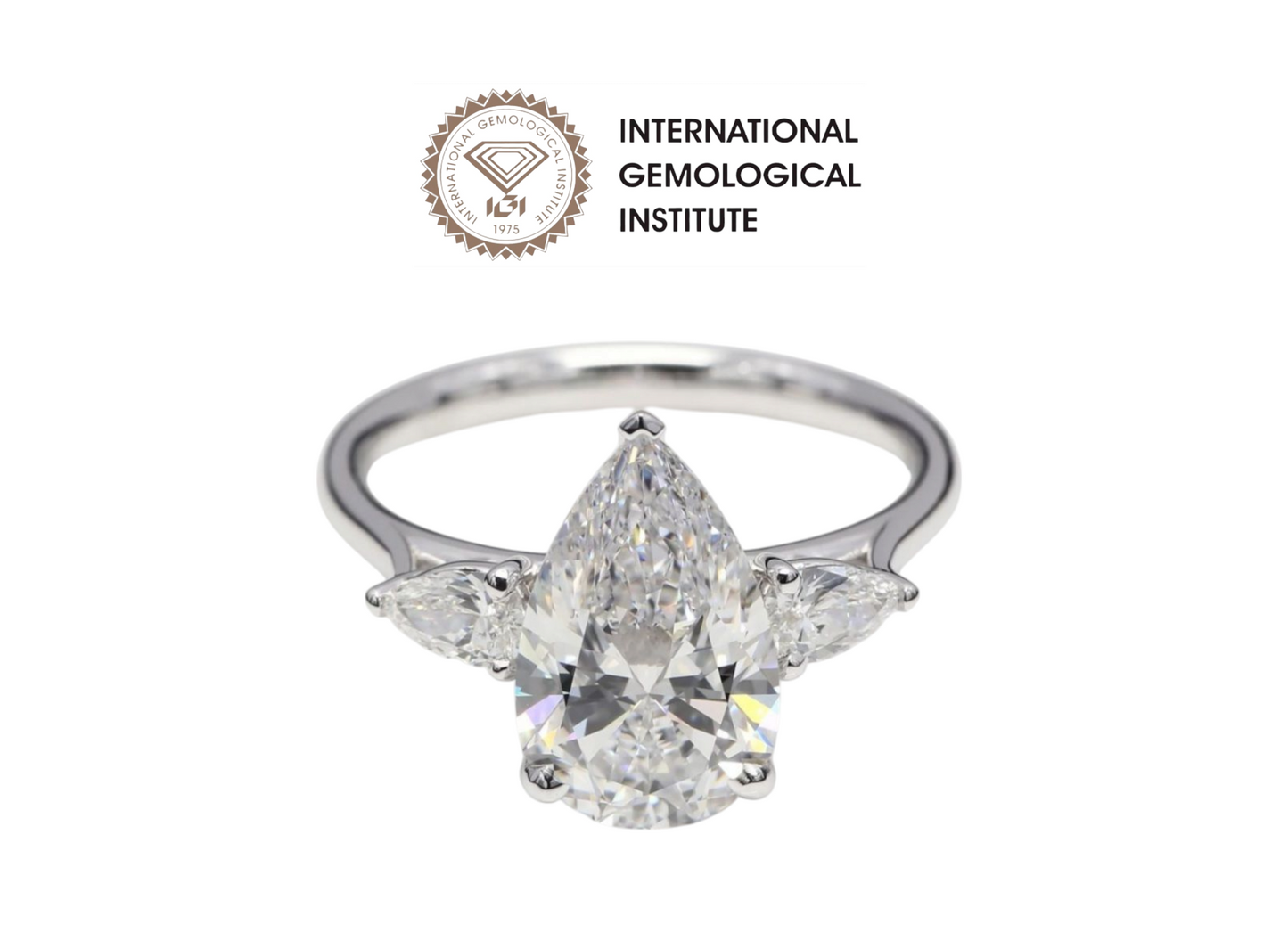 Anello trilogy in oro bianco e diamanti naturali taglio pera 3.10ct