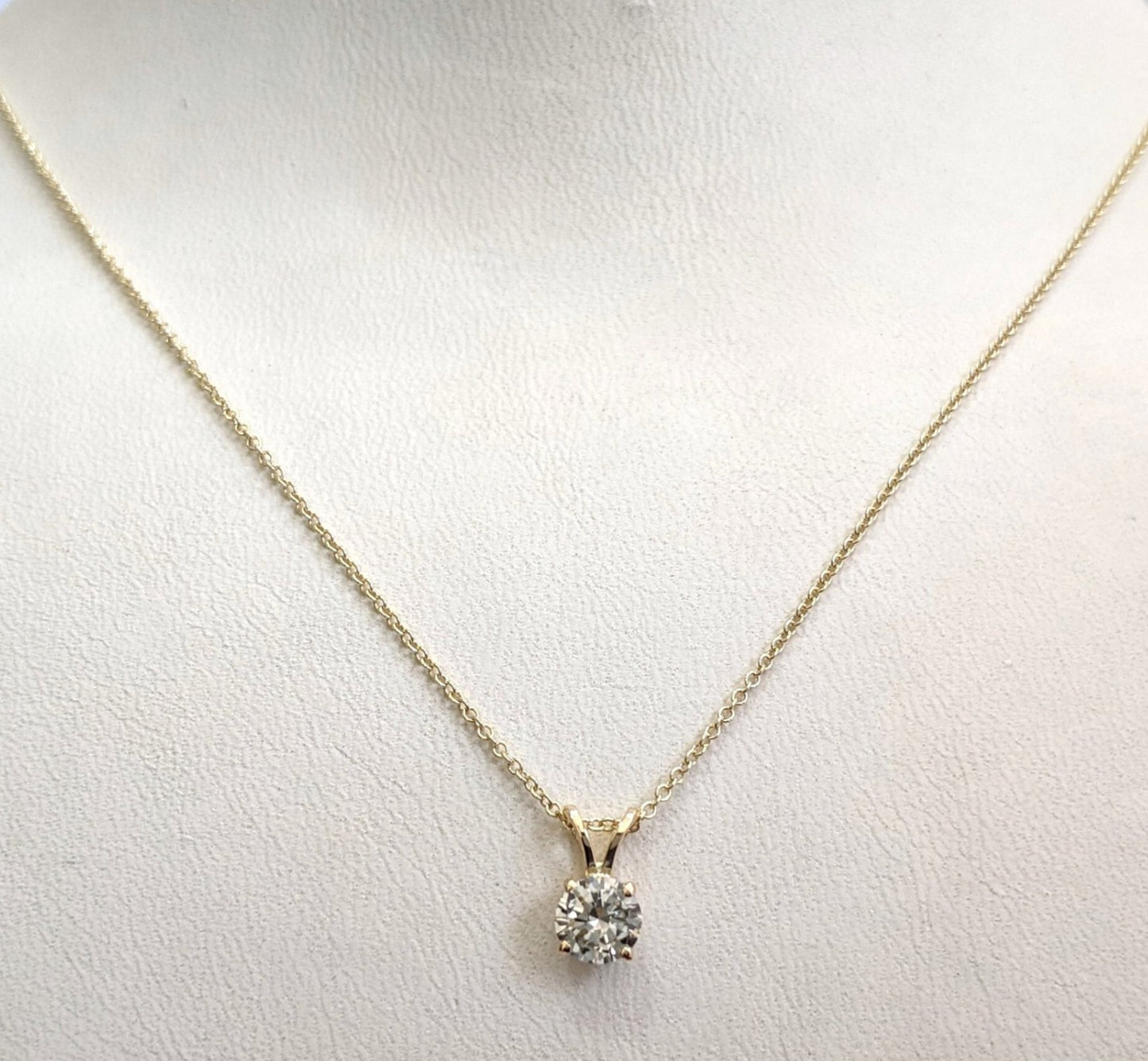 Ciondolo punto luce in oro e diamante naturale certificato IGI 0.30ct D IF