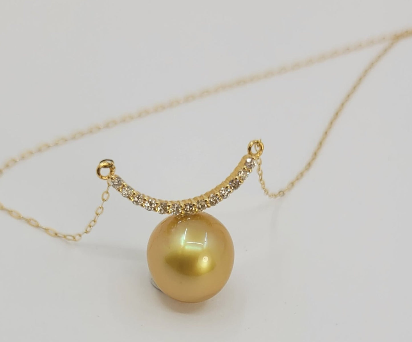 Collana in oro 18k e diamanti naturali 0.30ct e perle australiana 10mm