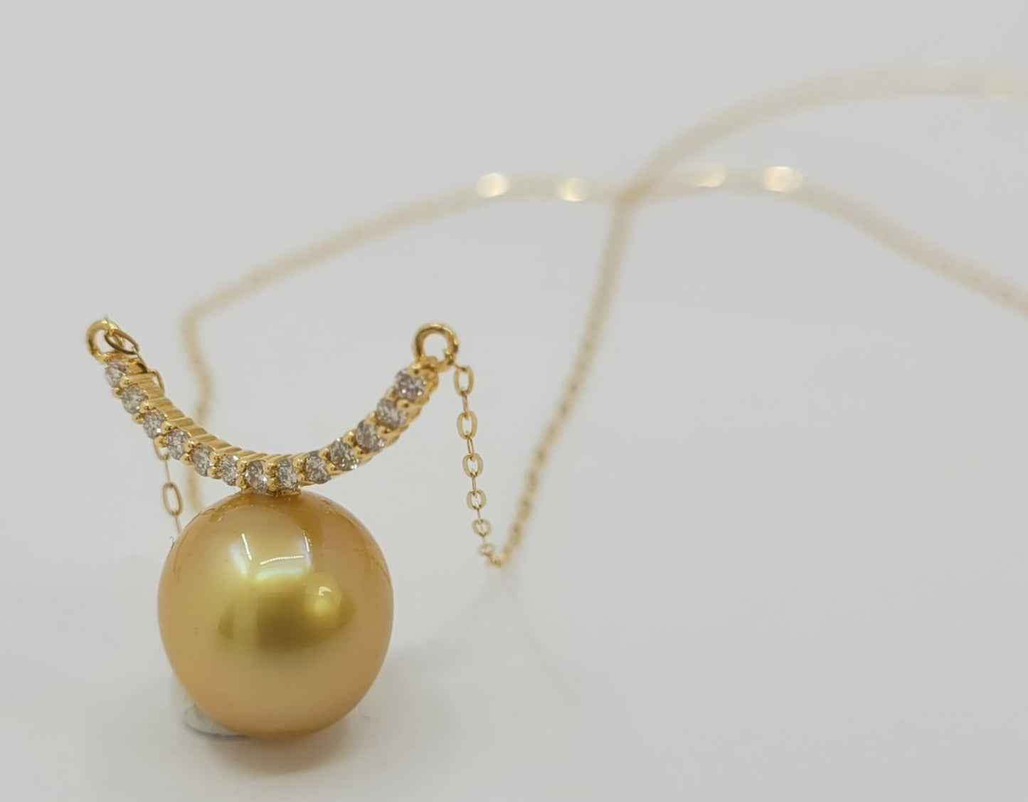 Collana in oro 18k e diamanti naturali 0.30ct e perle australiana 10mm