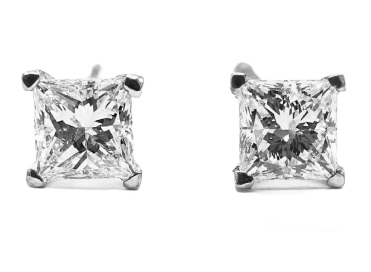 orecchini punto luce in oro bianco 18k e 2 diamanti naturali taglio princess 0,30 ct