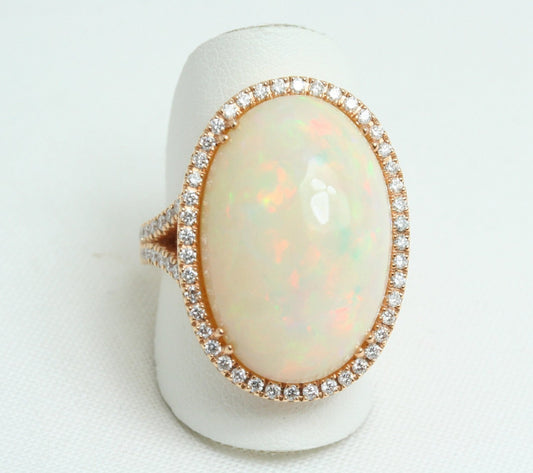 Anello in oro giallo e diamanti naturali 0.81ct  e opale 1630ct