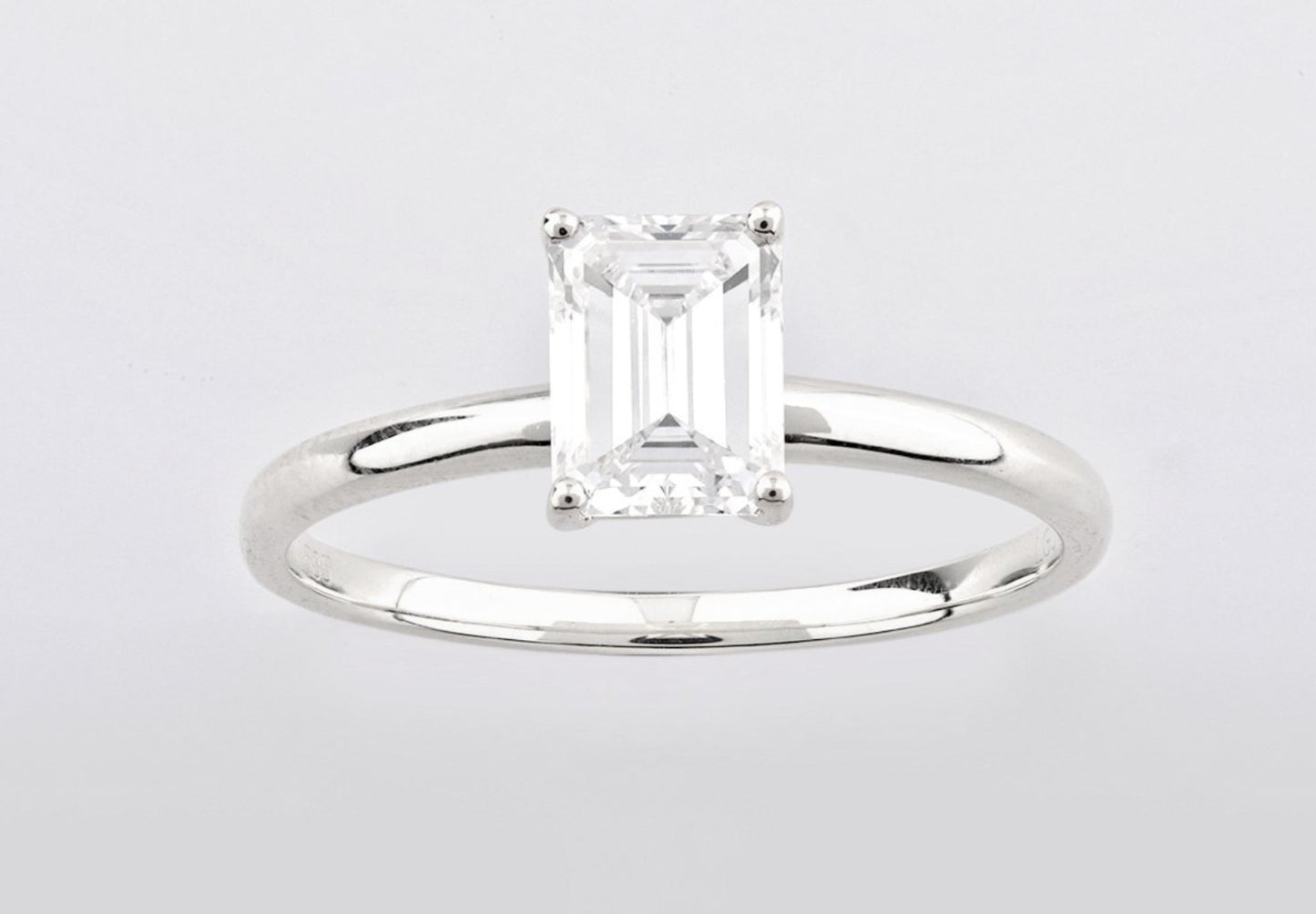 Anello solitario in oro bianco 18k e diamante naturale taglio smeraldo 1.20ct